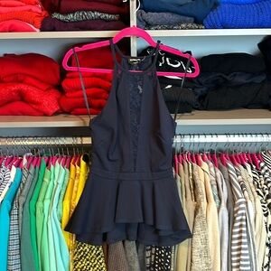 Bebe navy with navy lace sleeveless peplum style top size XS NWT